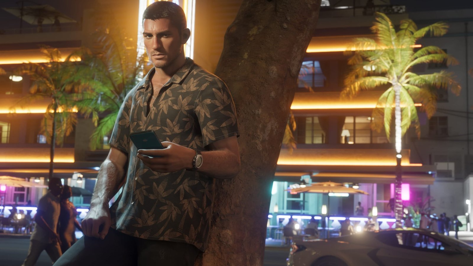 Jason Duval standing beneath the neon lights of Vice City in Grand Theft Auto VI